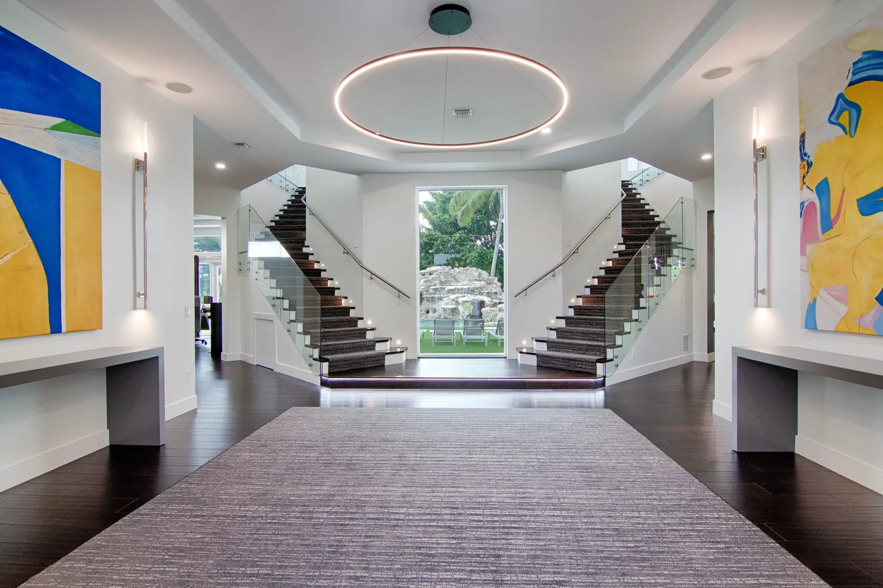 Double staircase and entry hall at Aiken Court