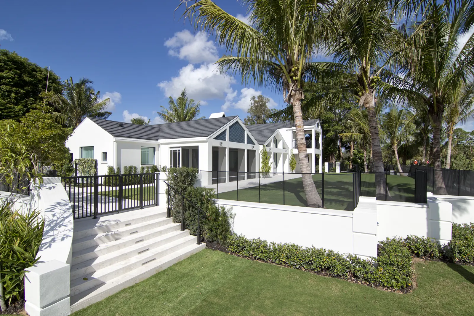 Facade And Courtyard at Breakers West Terrace