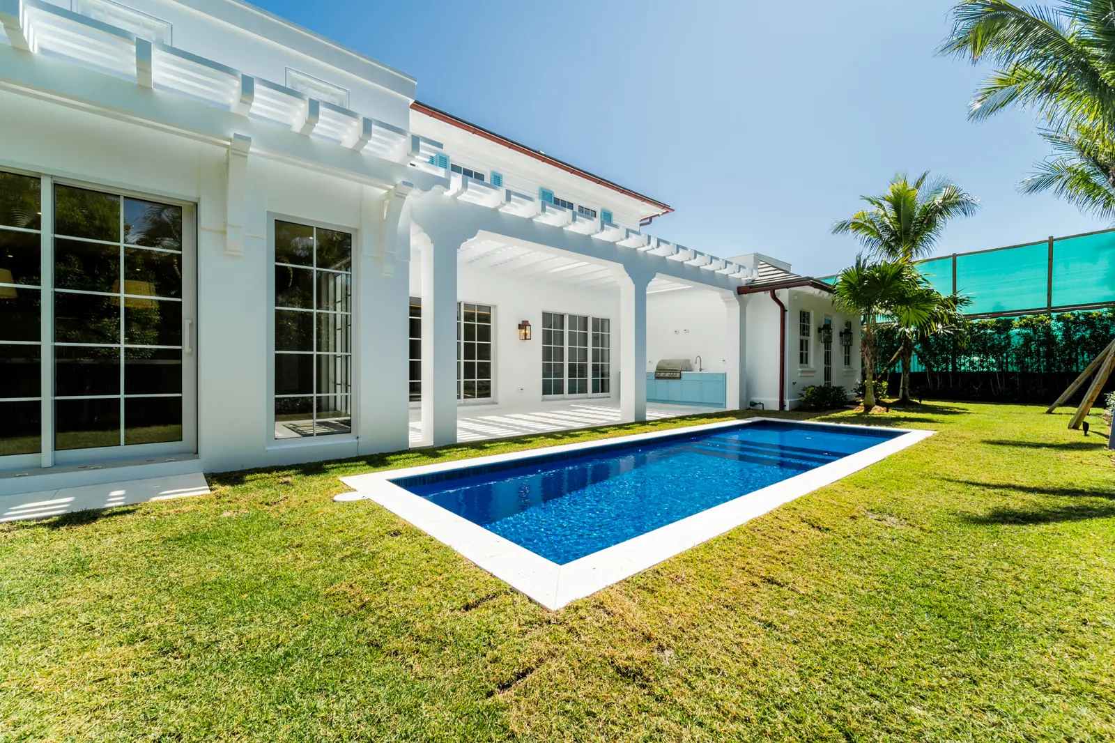 Rear elevation and pool at Ibis Isle
