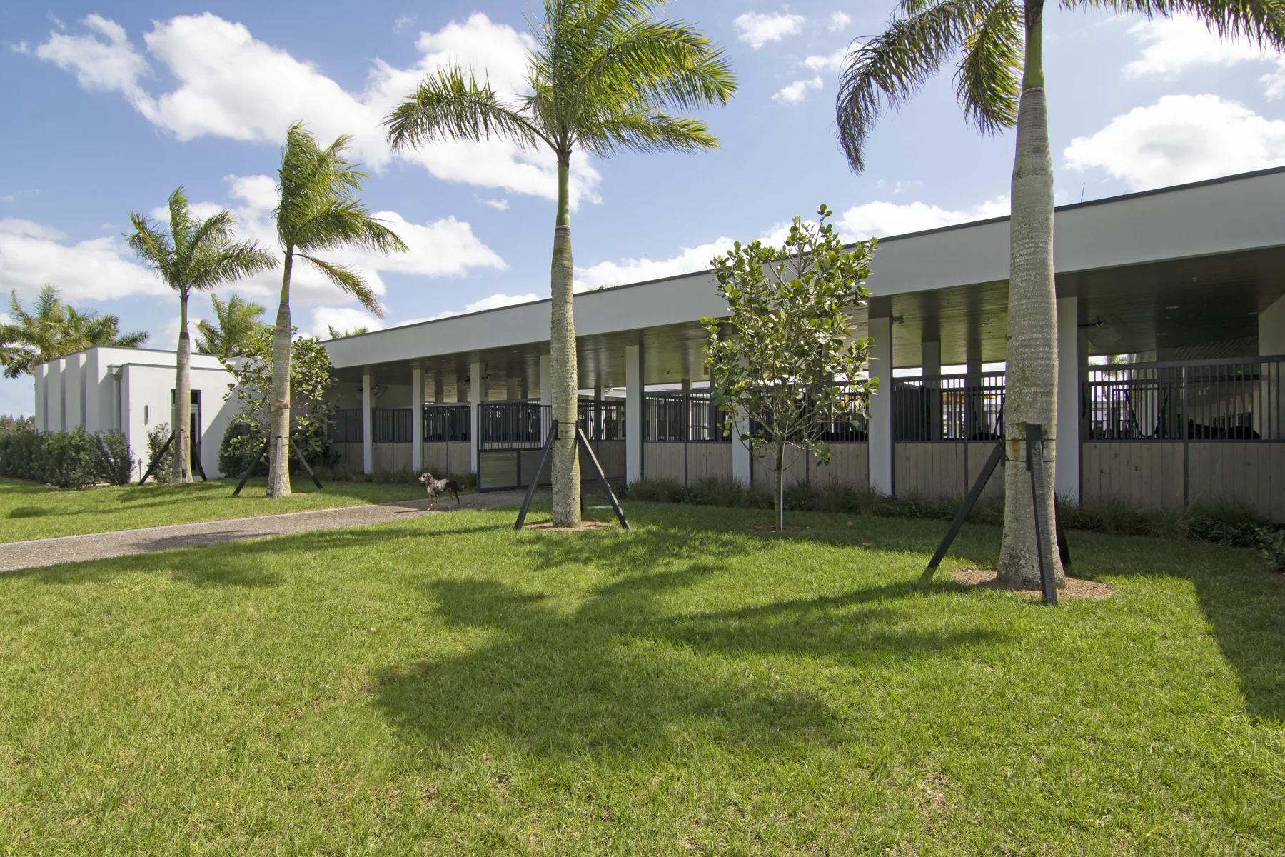 Landscaped stable courtyard at Wellington Preserve Polo Farm
