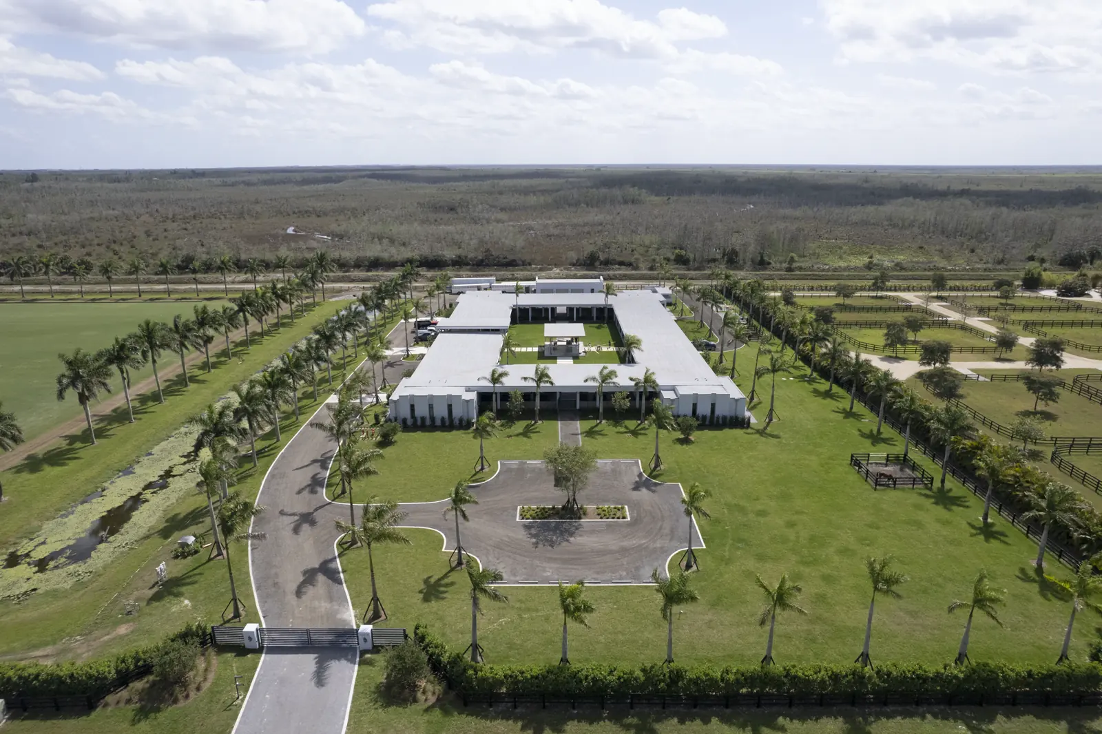 Aerial view of Wellington Preserve Polo Farm and its surrounding equestrian grounds