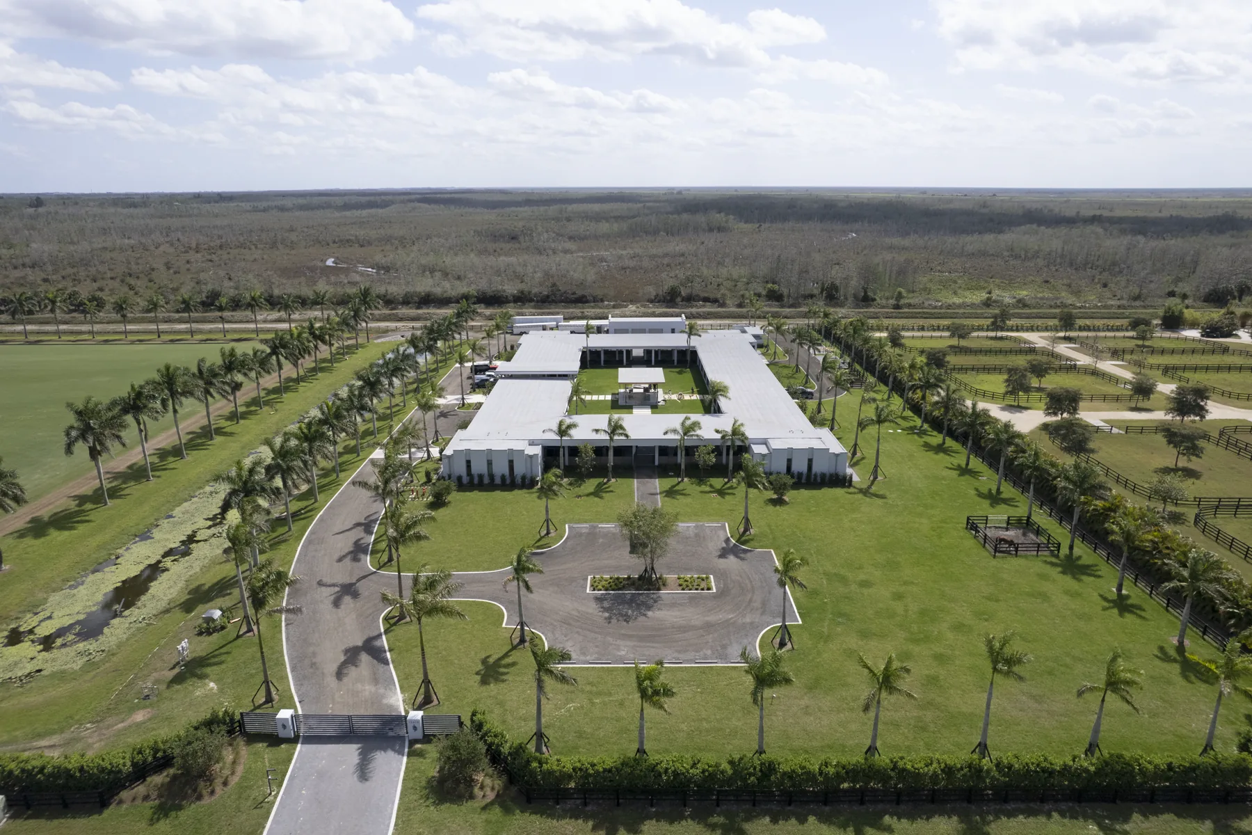 Aerial view of Wellington Preserve Polo Farm and its surrounding equestrian grounds