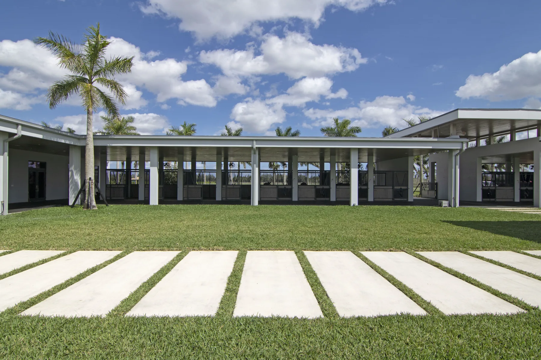 Wide view of the stable courtyard at Wellington Preserve