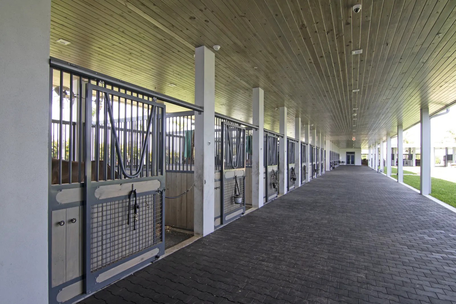 Stable Aisle And Support at Wellington Preserve Polo Farm